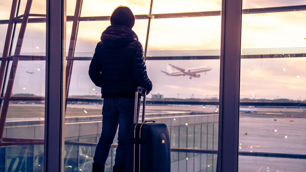 Traveller silhouette at airport